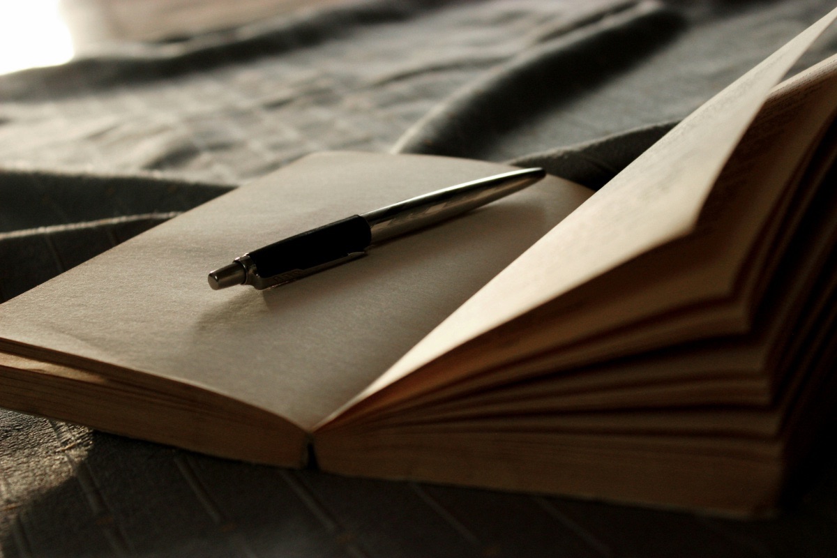 Open notebook and pen, ready for an ADHD coaching session